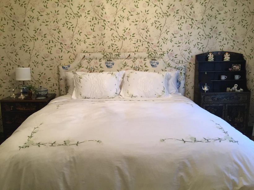 Upholstered bed with embroidered linens — upholstered by M&M Upholstery, Dallas