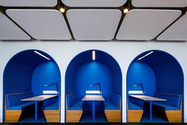 Booth pods in blue and orange — upholstered by M&M Upholstery, Dallas
