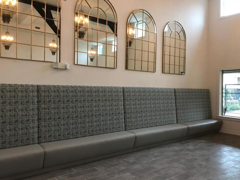 Long banquette run in grey — upholstered by M&M Upholstery, Dallas