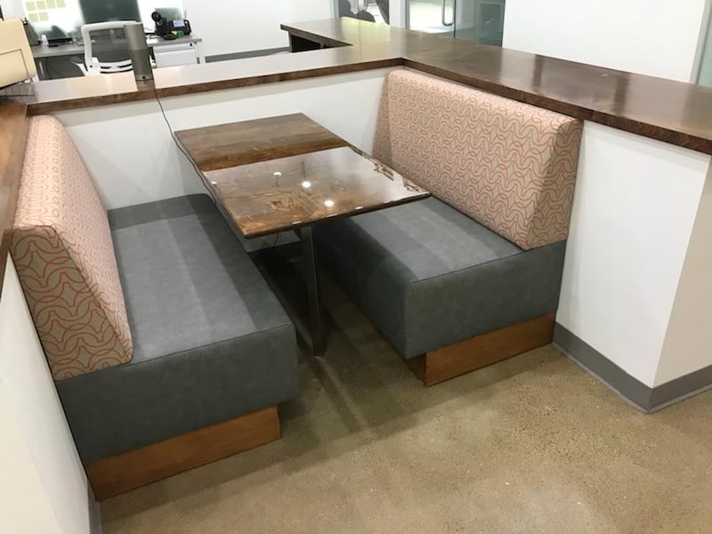 Booth seating with timber tables — upholstered by M&M Upholstery, Dallas