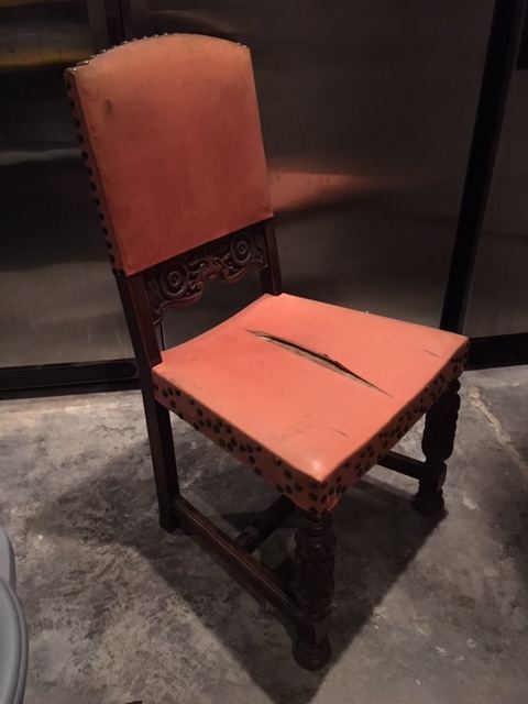 Treatment chair in orange leather — upholstered by M&M Upholstery, Dallas